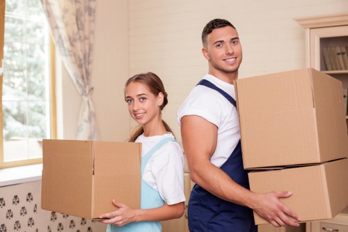 Professional movers loading a van in Edgware
